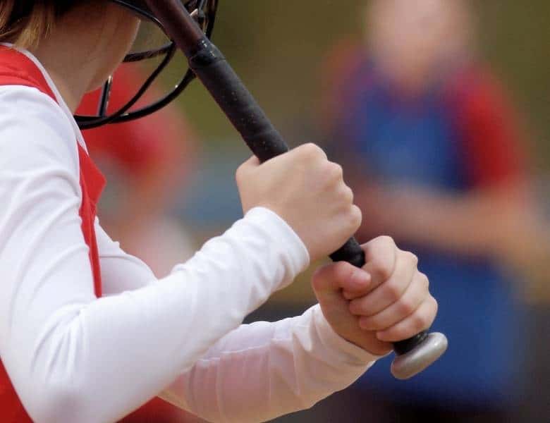 Kid to Hit Off a Pitching Machine